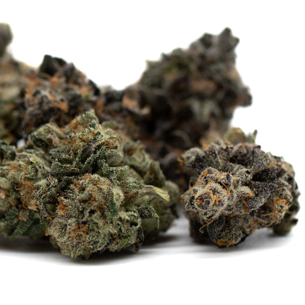 Chunky Monkey Indoor THCa Flower featuring glistening cannabis buds with trichomes